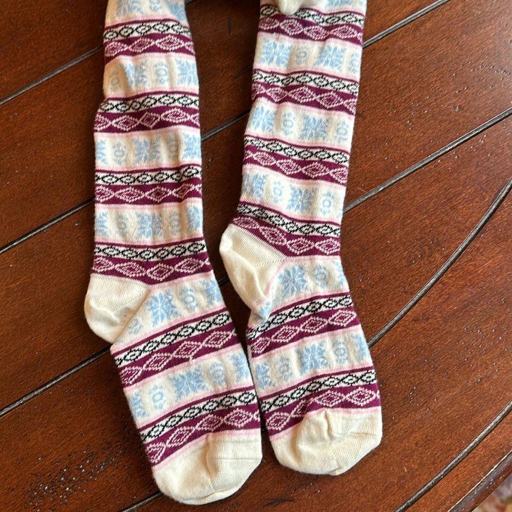 NWOT Hanna Andersson tights.  Size 130/140. Cream w/ pattern.